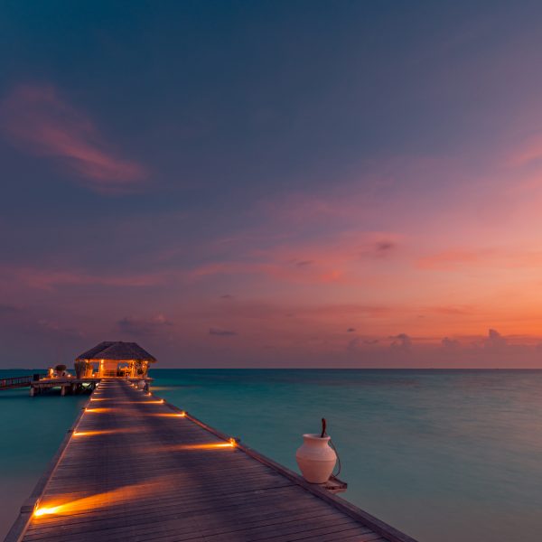 amazing-sunset-panorama-at-maldives-luxury-resort-villas-seascape-with-soft-led-lights-sunset-sky